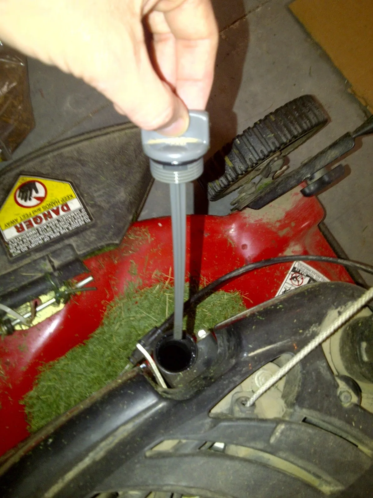 how much oil does a lawn mower take