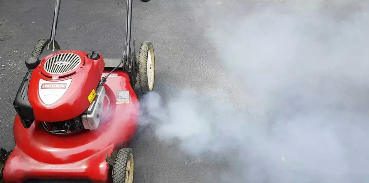 is white smoke from lawn mower dangerous